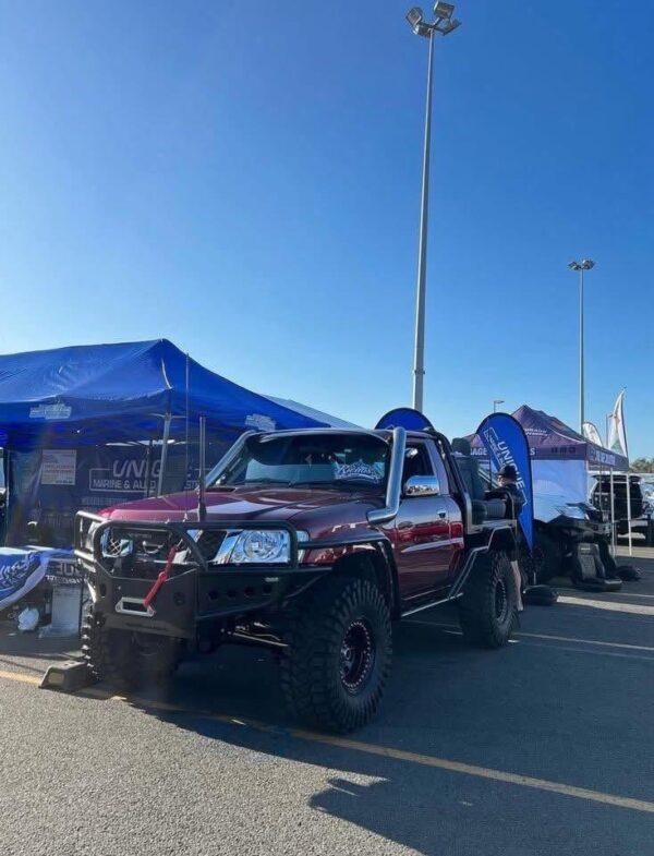 WhatsApp-Image-2025-10-07-at-5.32.42-PM-1.jpeg Toyota LandCruiser Sunvisor – Deep Burgundy Red (Custom Fit)