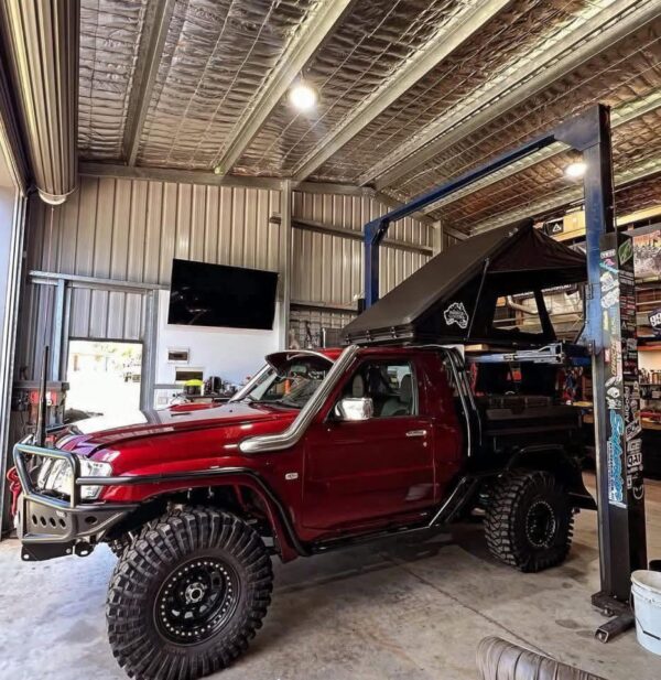 WhatsApp-Image-2025-10-07-at-5.32.42-PM.jpeg Toyota LandCruiser Sunvisor – Deep Burgundy Red (Custom Fit)